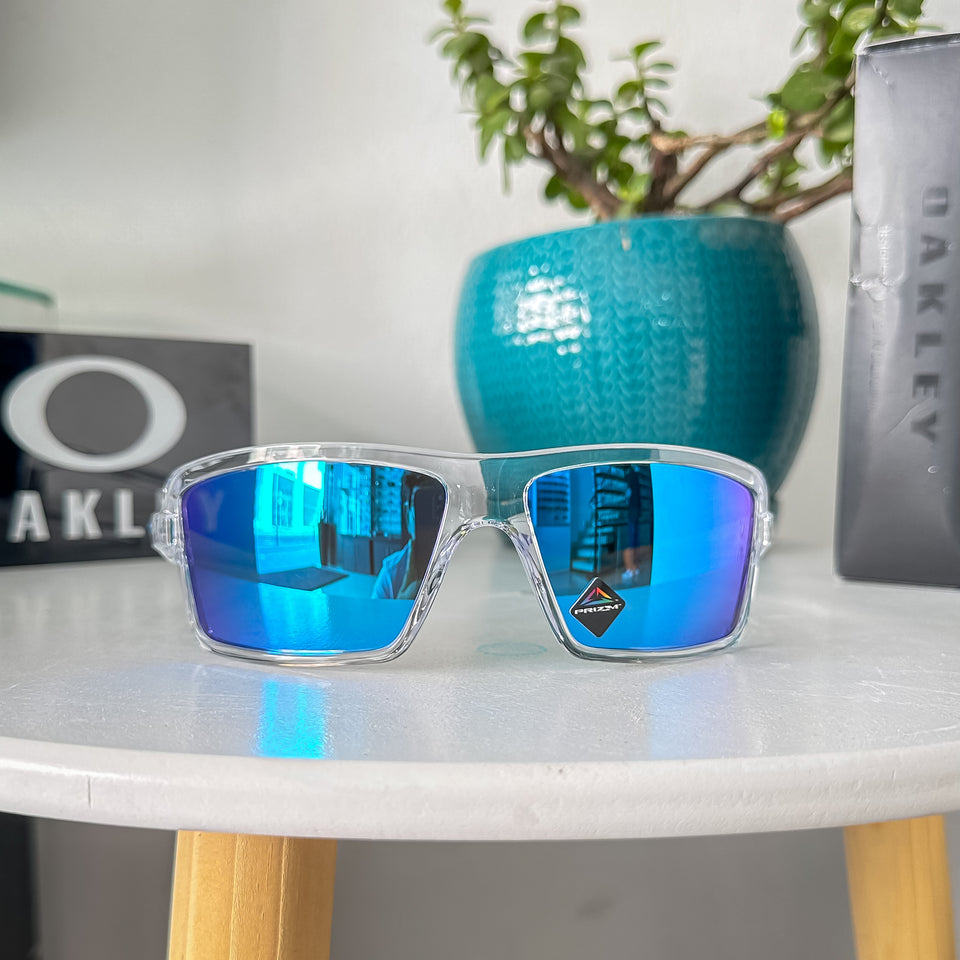 Oakley Cables OO9129 – 0563 SAPPHIRE POLARIZED TRANSPARENTE LUNAS AZUL