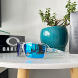 Oakley Cables OO9129 – 0563 SAPPHIRE POLARIZED TRANSPARENTE LUNAS AZUL