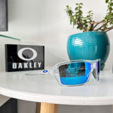 Oakley Cables OO9129 – 0563 SAPPHIRE POLARIZED TRANSPARENTE LUNAS AZUL