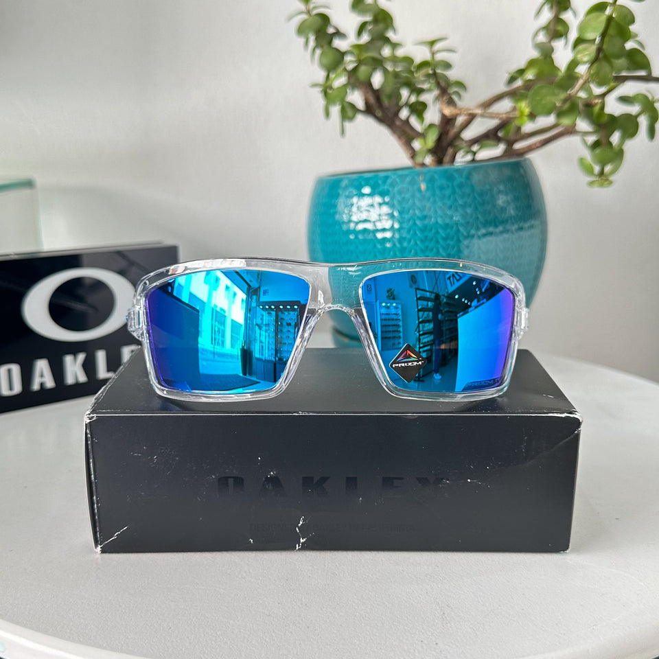 Oakley Cables OO9129 – 0563 SAPPHIRE POLARIZED TRANSPARENTE LUNAS AZUL